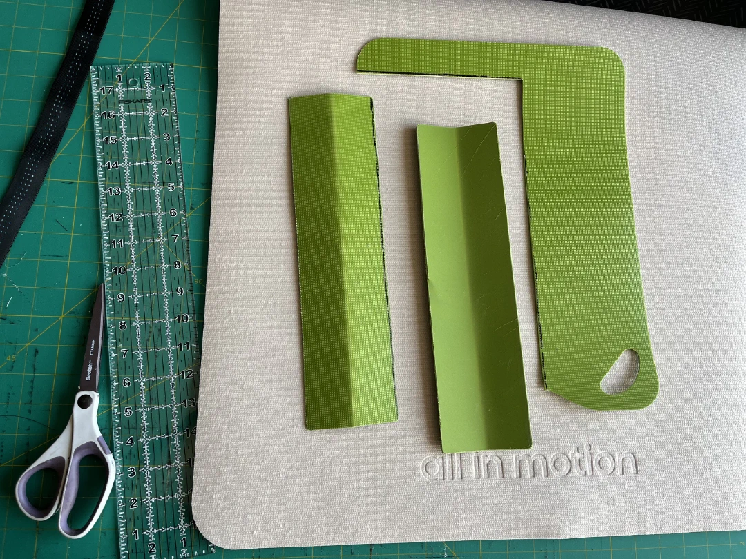 Green plastic cutting board and yoga mat source materials.
