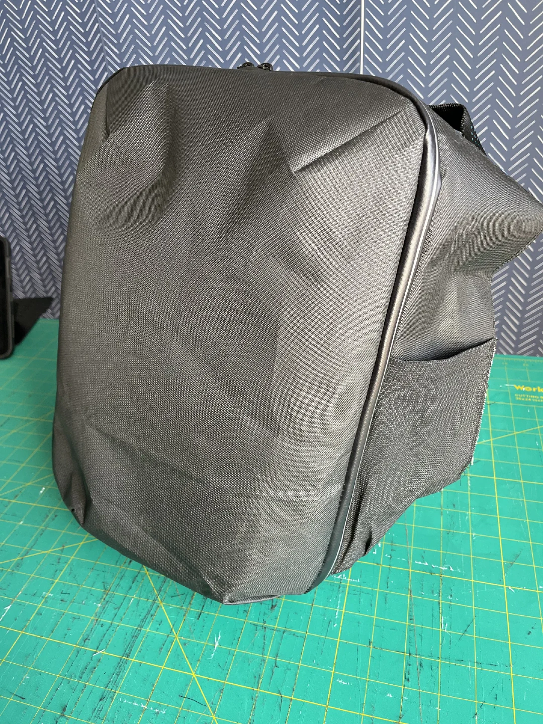 The black shell turned right side out, holding the pack’s shape.