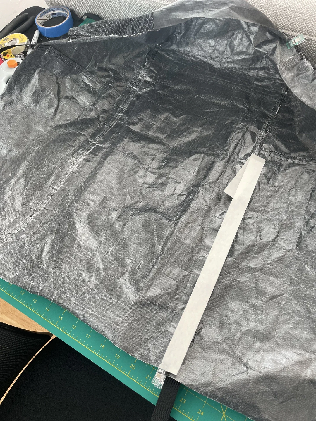 Seam taping the interior of the main pack body.