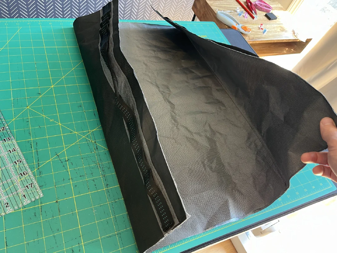 The bag turned right side out, grey liner showing
